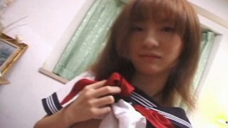 Mesmerizing Japanese student Himiko gives a head to hard cock